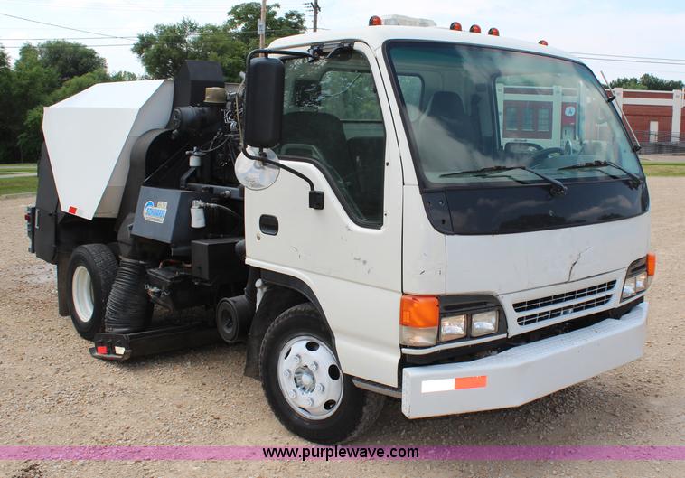 image for item H6736 1999 Isuzu NPR sweeper truck