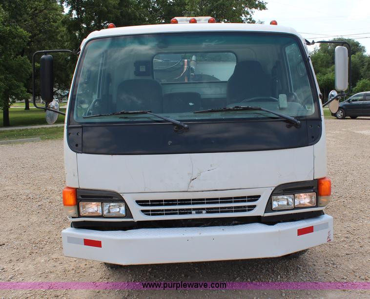 image for item H6736 1999 Isuzu NPR sweeper truck