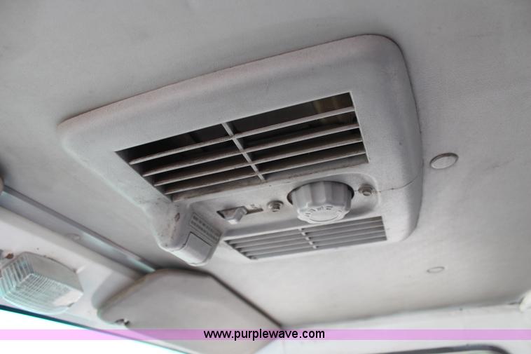 image for item H6736 1999 Isuzu NPR sweeper truck