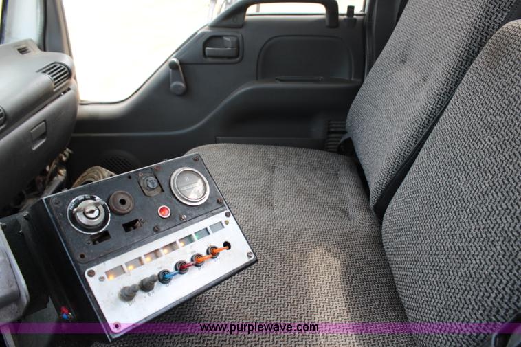 image for item H6736 1999 Isuzu NPR sweeper truck