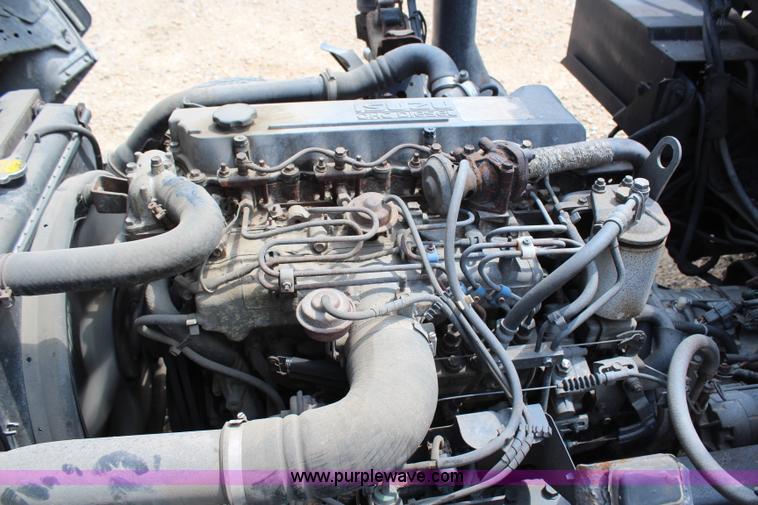 image for item H6736 1999 Isuzu NPR sweeper truck