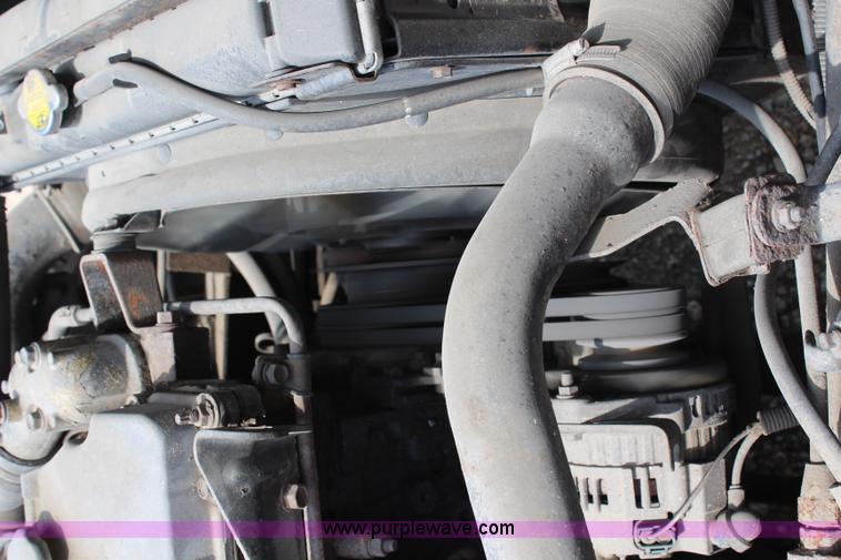 image for item H6736 1999 Isuzu NPR sweeper truck