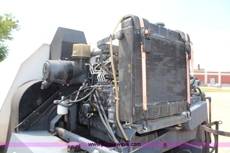 image for item H6736 1999 Isuzu NPR sweeper truck