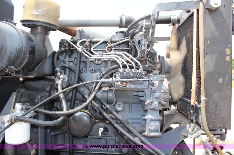 image for item H6736 1999 Isuzu NPR sweeper truck