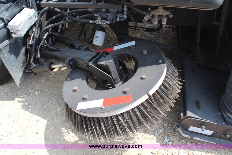 image for item H6736 1999 Isuzu NPR sweeper truck