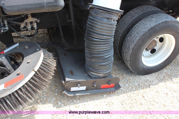 image for item H6736 1999 Isuzu NPR sweeper truck