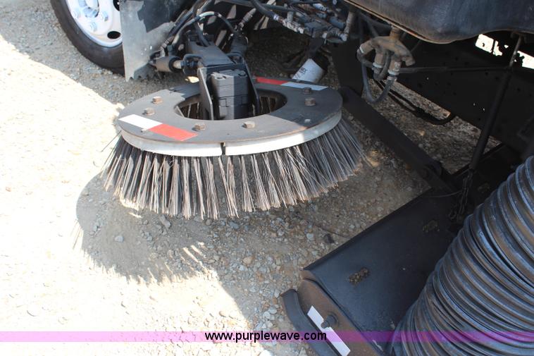 image for item H6736 1999 Isuzu NPR sweeper truck