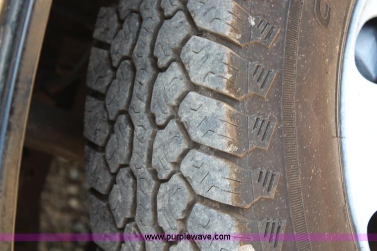 image for item H6736 1999 Isuzu NPR sweeper truck