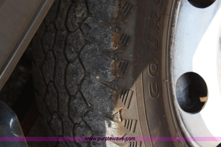 image for item H6736 1999 Isuzu NPR sweeper truck