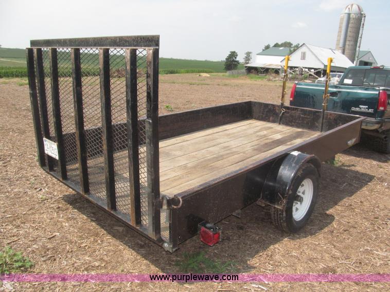image for item F7079 2003 H&H flatbed utility trailer