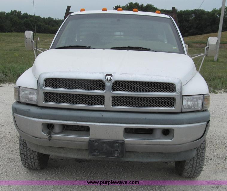 image for item G2070 1998 Dodge Ram 3500 Laramie SLT flatbed pickup truck