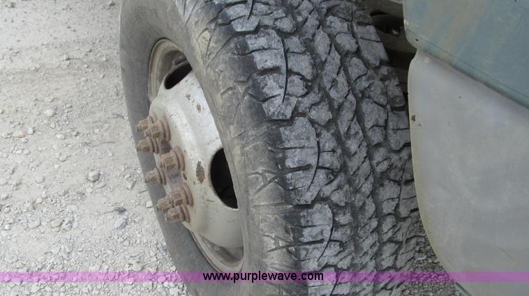 image for item G2070 1998 Dodge Ram 3500 Laramie SLT flatbed pickup truck