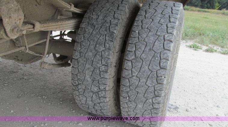 image for item G2070 1998 Dodge Ram 3500 Laramie SLT flatbed pickup truck