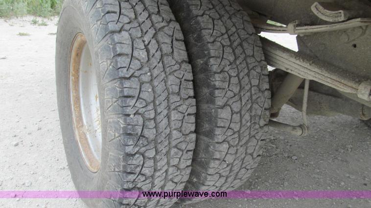 image for item G2070 1998 Dodge Ram 3500 Laramie SLT flatbed pickup truck