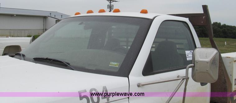 image for item G2070 1998 Dodge Ram 3500 Laramie SLT flatbed pickup truck