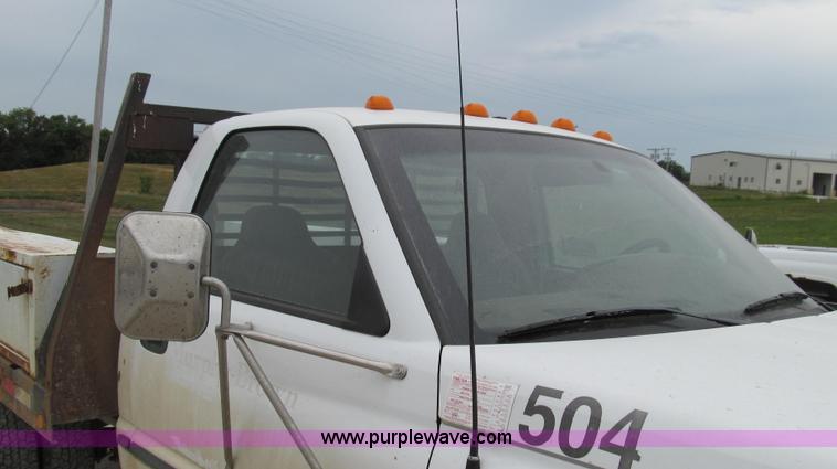 image for item G2070 1998 Dodge Ram 3500 Laramie SLT flatbed pickup truck