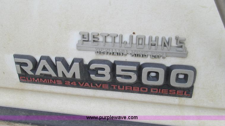 image for item G2070 1998 Dodge Ram 3500 Laramie SLT flatbed pickup truck