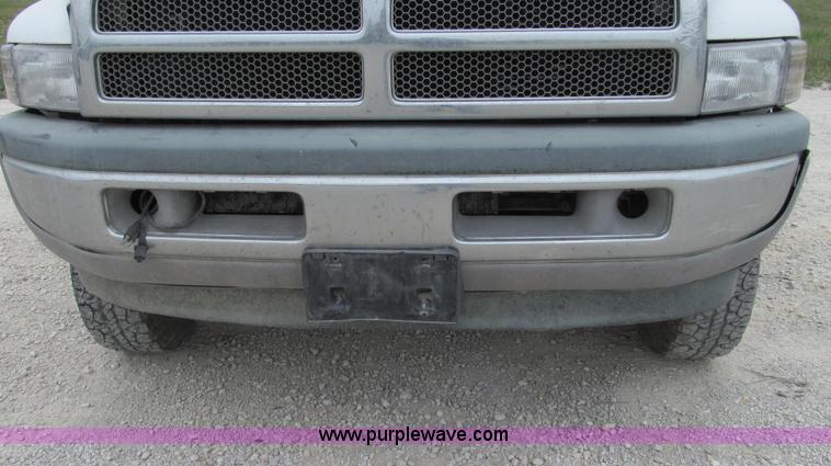 image for item G2070 1998 Dodge Ram 3500 Laramie SLT flatbed pickup truck