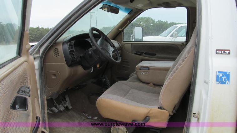 image for item G2070 1998 Dodge Ram 3500 Laramie SLT flatbed pickup truck