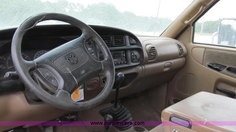 image for item G2070 1998 Dodge Ram 3500 Laramie SLT flatbed pickup truck