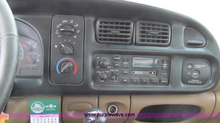 image for item G2070 1998 Dodge Ram 3500 Laramie SLT flatbed pickup truck