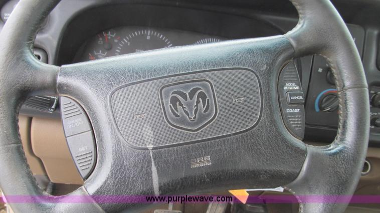 image for item G2070 1998 Dodge Ram 3500 Laramie SLT flatbed pickup truck