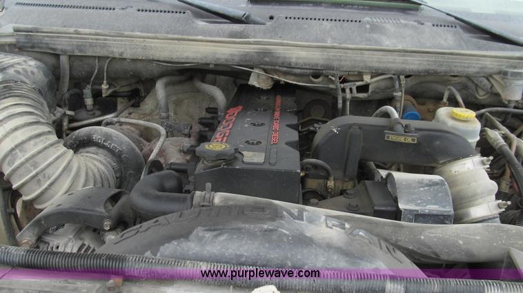 image for item G2070 1998 Dodge Ram 3500 Laramie SLT flatbed pickup truck