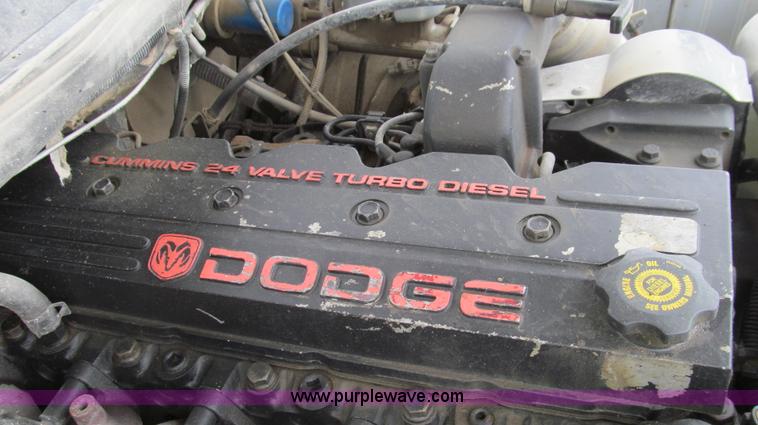 image for item G2070 1998 Dodge Ram 3500 Laramie SLT flatbed pickup truck