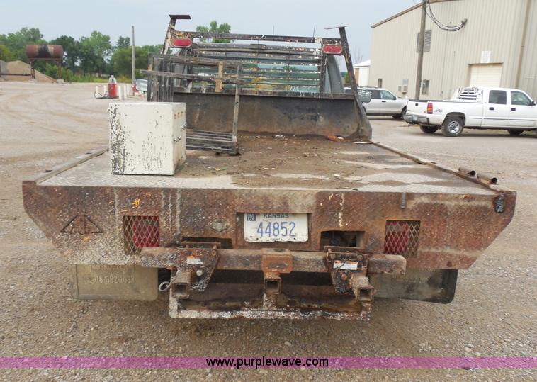 image for item H9854 1990 Ford F350 flatbed pickup truck