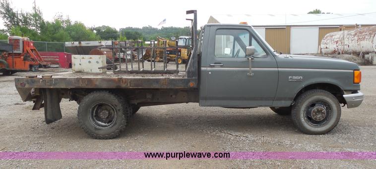 image for item H9854 1990 Ford F350 flatbed pickup truck