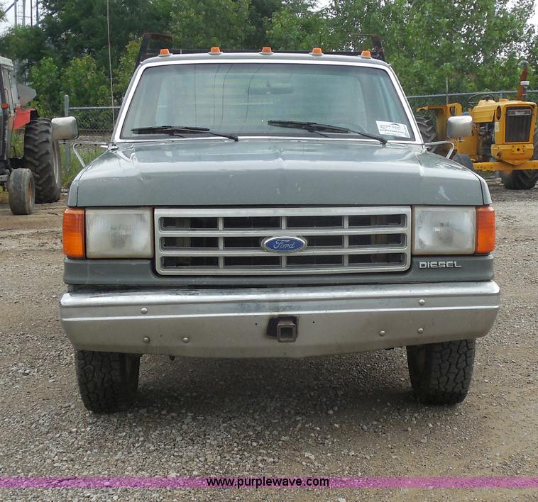 image for item H9854 1990 Ford F350 flatbed pickup truck