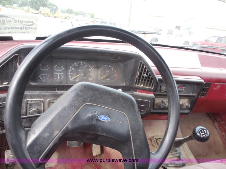 image for item H9854 1990 Ford F350 flatbed pickup truck