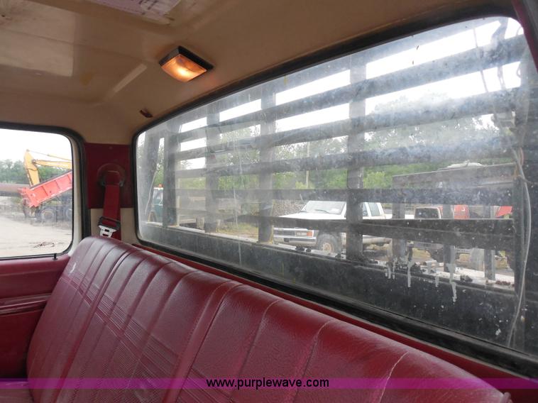 image for item H9854 1990 Ford F350 flatbed pickup truck