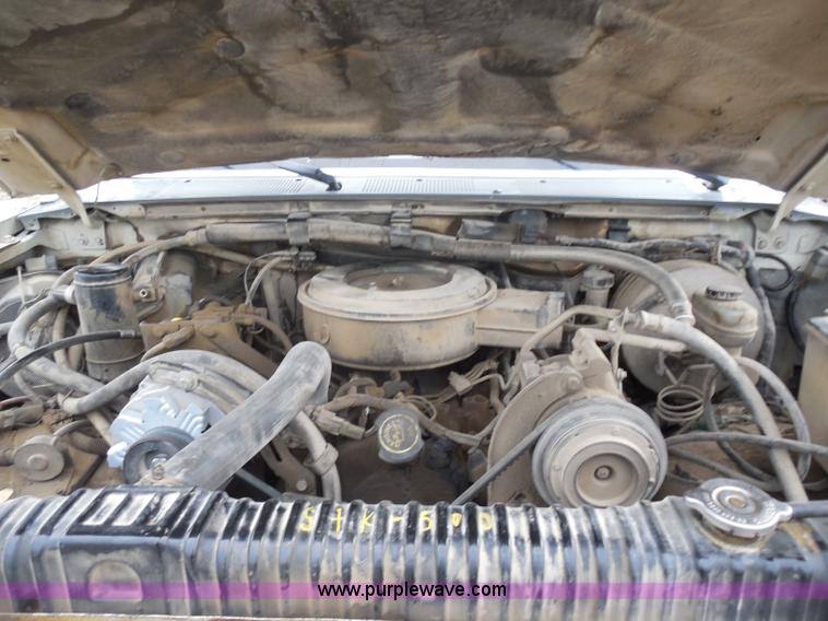 image for item H9854 1990 Ford F350 flatbed pickup truck