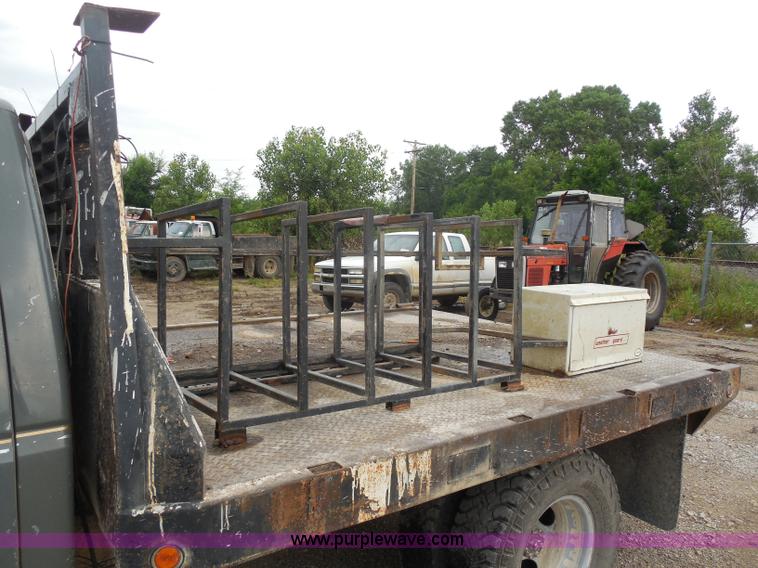 image for item H9854 1990 Ford F350 flatbed pickup truck