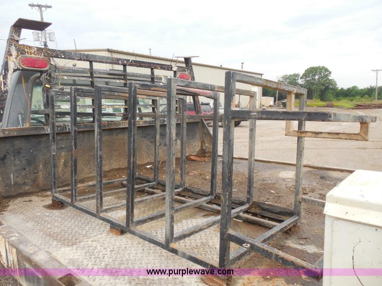 image for item H9854 1990 Ford F350 flatbed pickup truck