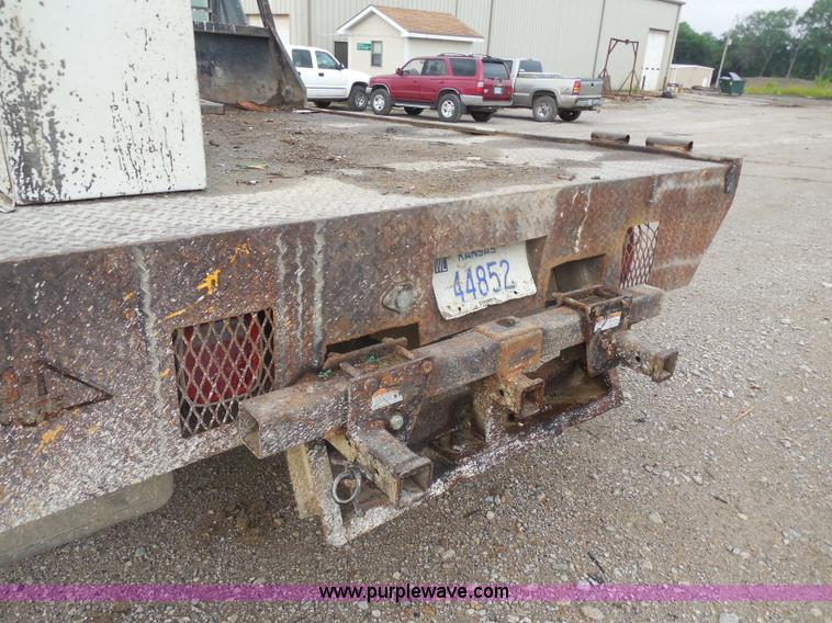 image for item H9854 1990 Ford F350 flatbed pickup truck