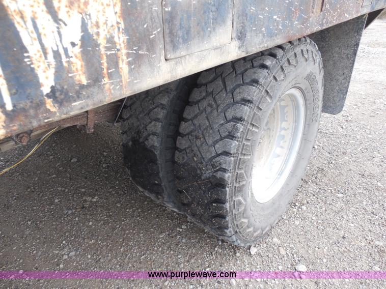 image for item H9854 1990 Ford F350 flatbed pickup truck