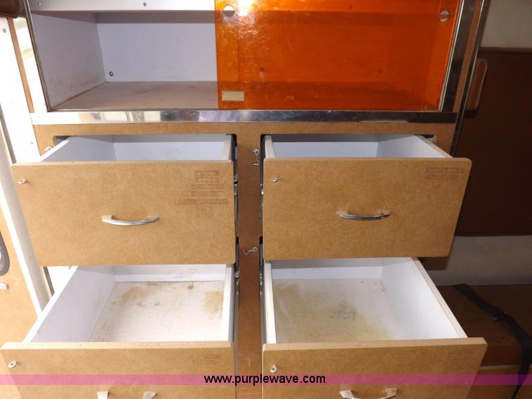 image for item I7656 1980 Ford Chateau ambulance