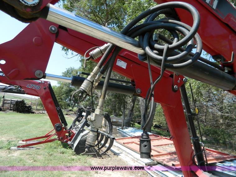 image for item AD9694 2010 Case IH L770 loader