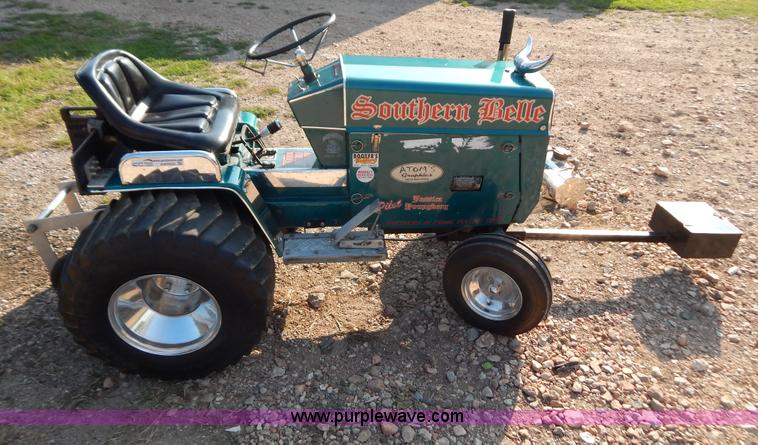 image for item AW9203 Cub Cadet pulling lawn tractor