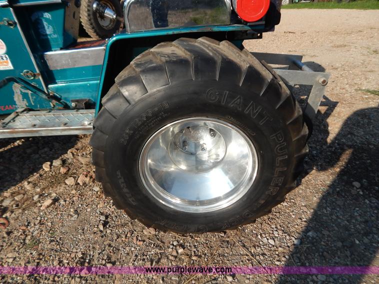 image for item AW9203 Cub Cadet pulling lawn tractor