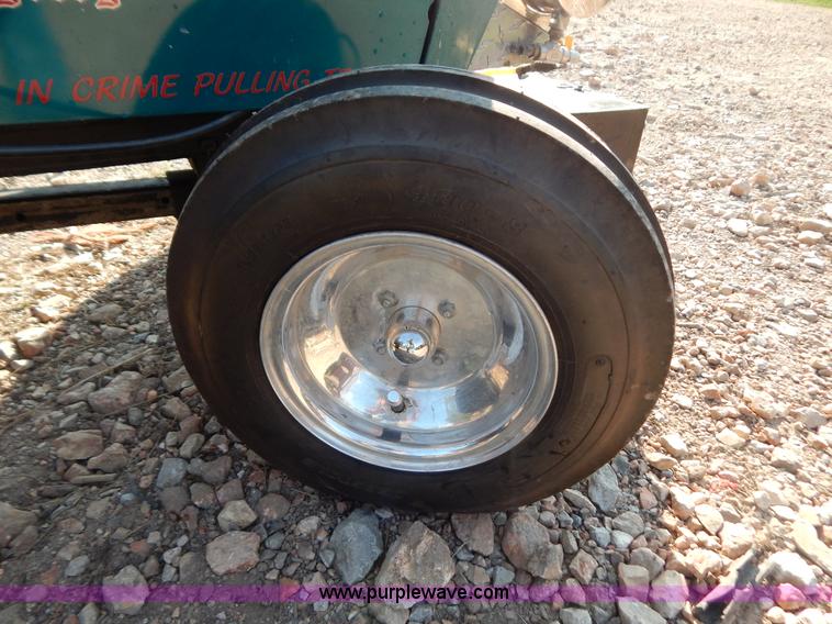 image for item AW9203 Cub Cadet pulling lawn tractor