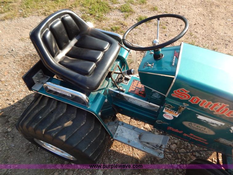image for item AW9203 Cub Cadet pulling lawn tractor