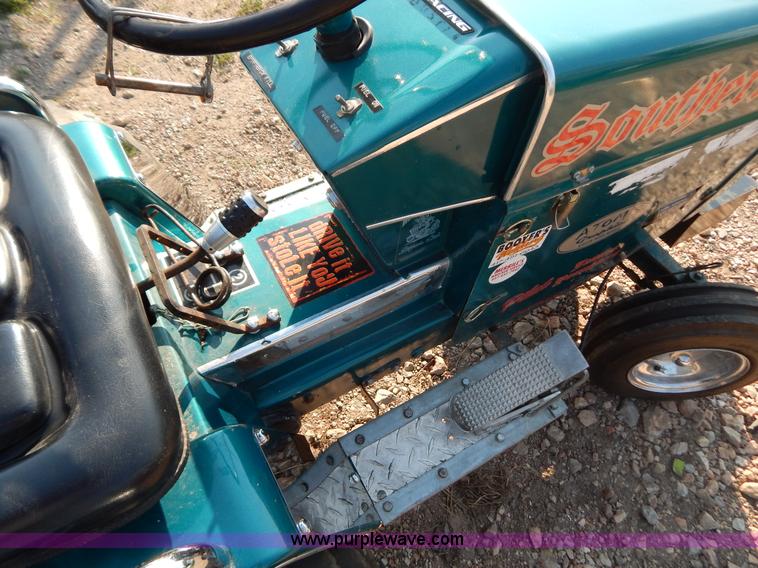 image for item AW9203 Cub Cadet pulling lawn tractor