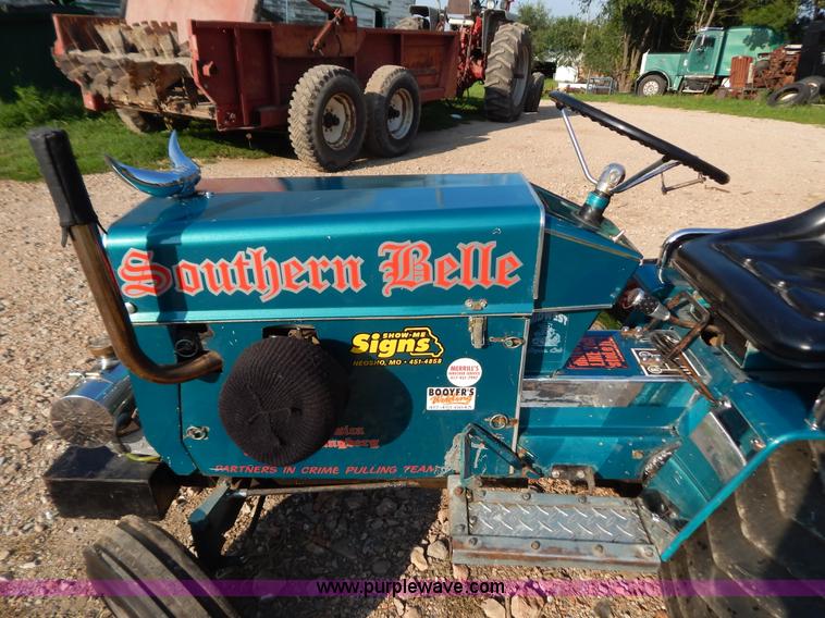 image for item AW9203 Cub Cadet pulling lawn tractor