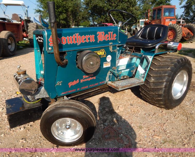 image for item AW9203 Cub Cadet pulling lawn tractor