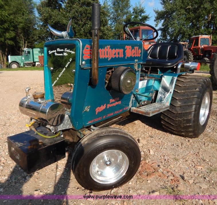 image for item AW9203 Cub Cadet pulling lawn tractor