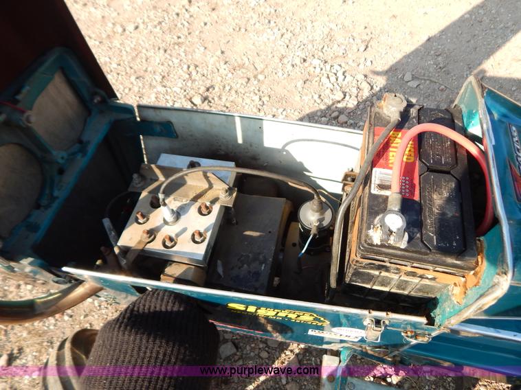 image for item AW9203 Cub Cadet pulling lawn tractor