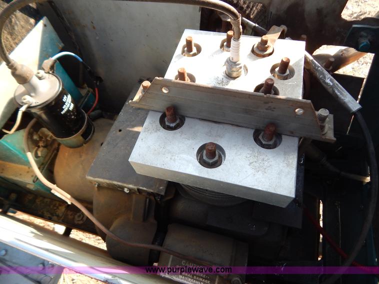 image for item AW9203 Cub Cadet pulling lawn tractor